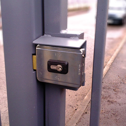 Pedestrian gate with an electric lock